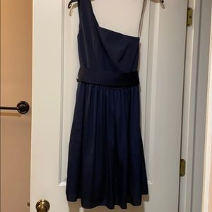 Short one shoulder dress with satin belt